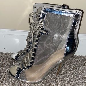 Silver lace up open-toe monochromatic heels. Size 5 1/2 in women’s.